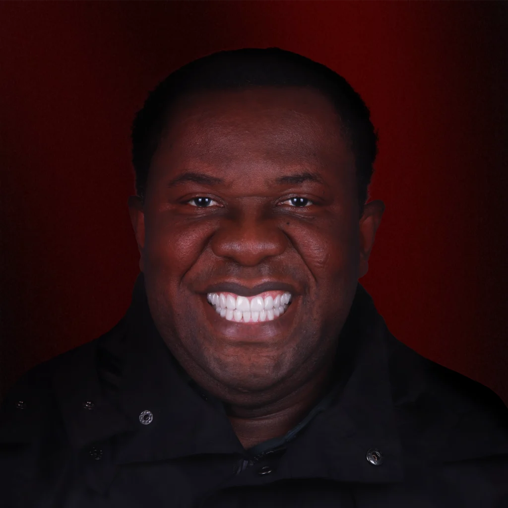 Man smiling confidently after cosmetic dentistry treatment
