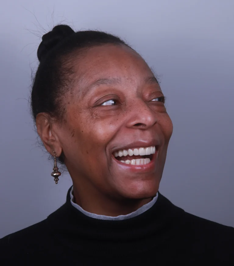 A woman with healthy teeth after dental implant treatment in Forest Hill, London